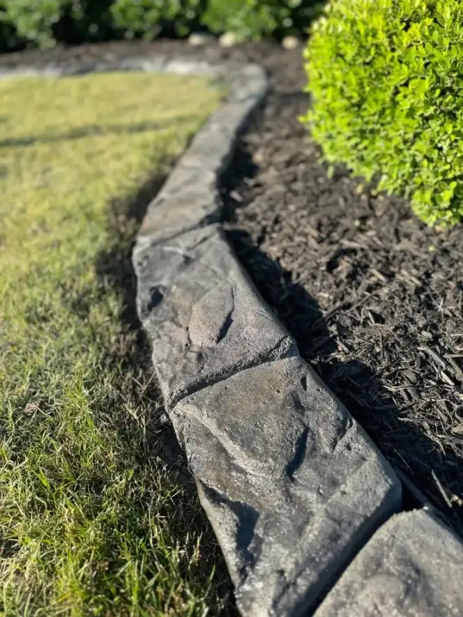 Decorative curbing along a well-maintained Central New York residential property