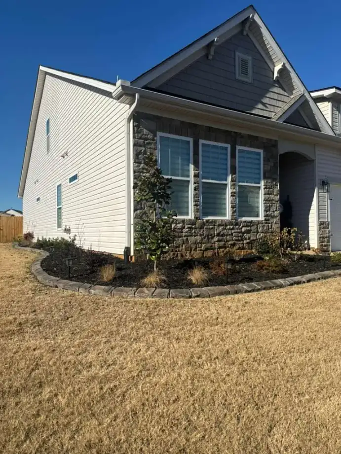 Commercial parking lot island with charcoal gray curbing