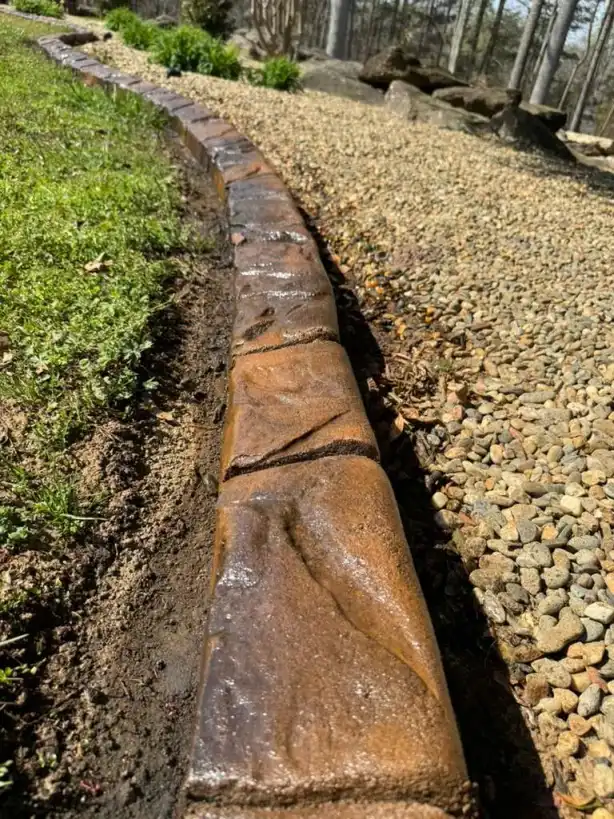 The L&S Decorative Curbing Co. crew preparing a job site in Central New York